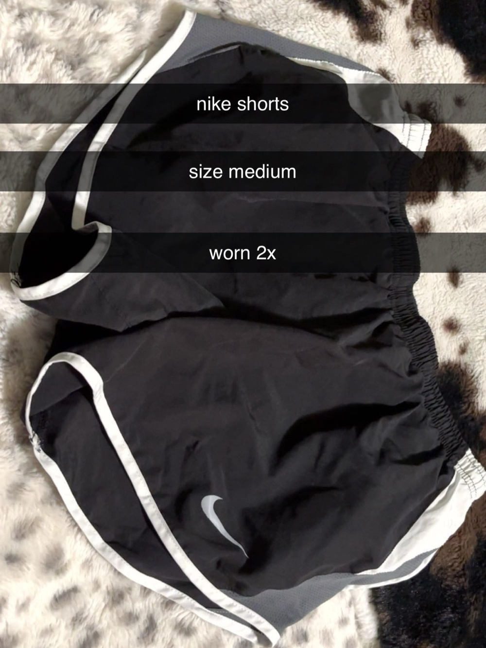 Nike Black Shorts with White Trim and Swoosh
